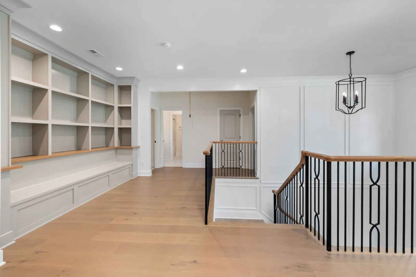 Professional hardwood installation in a modern foyer by an MBE certified contractor