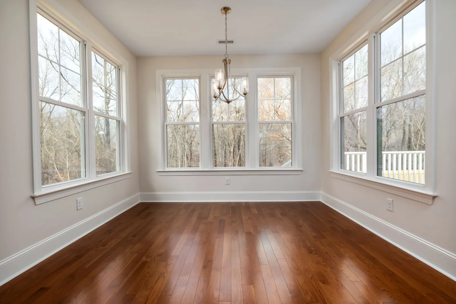 Commercial-grade wood flooring in a large open space
