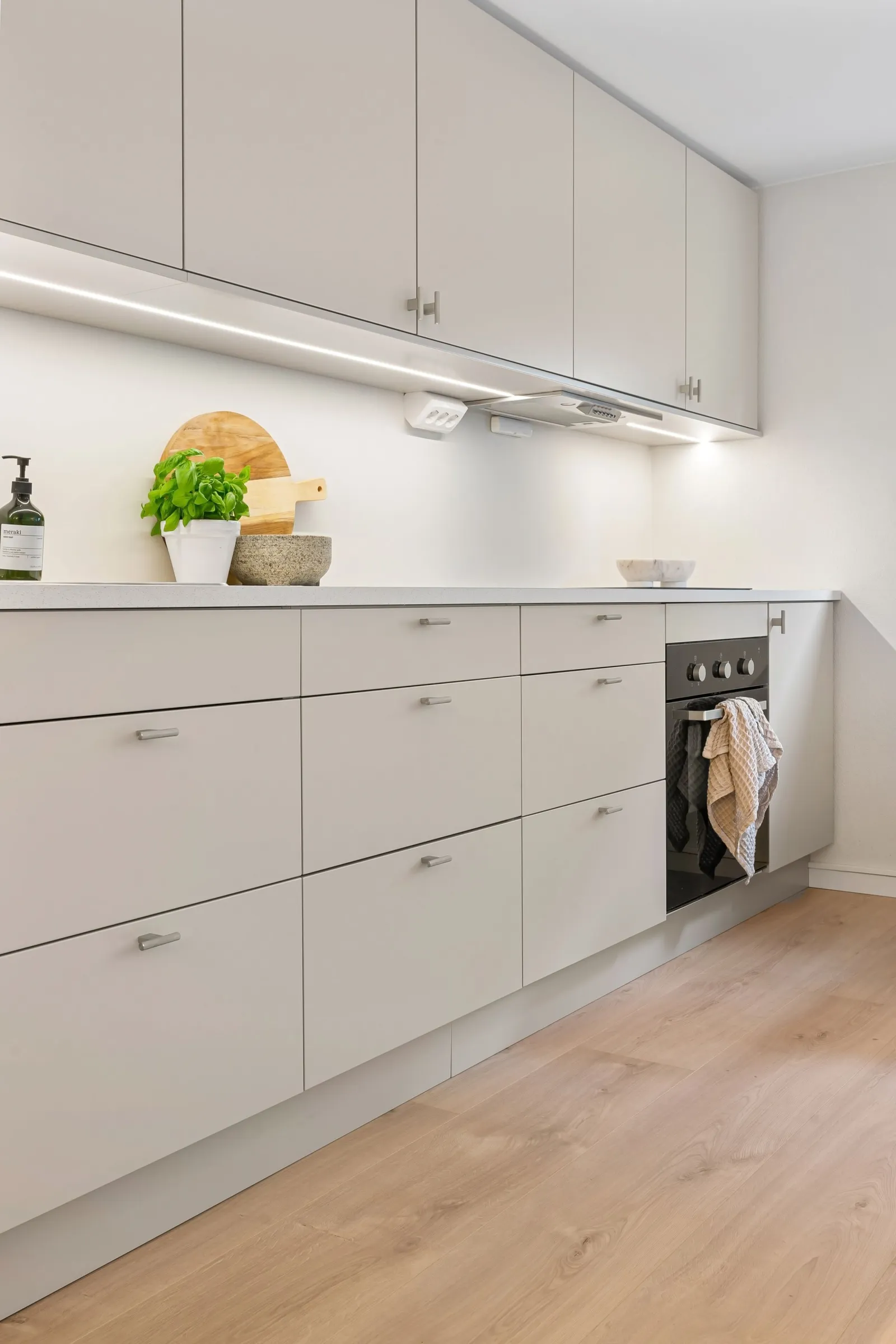 Vinyl plank flooring in a clean modern kitchen